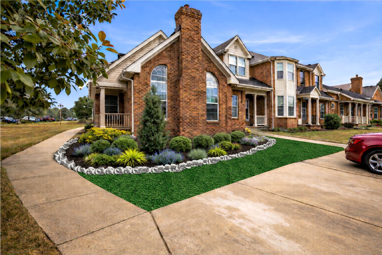 Brick home with a finished landscape concept